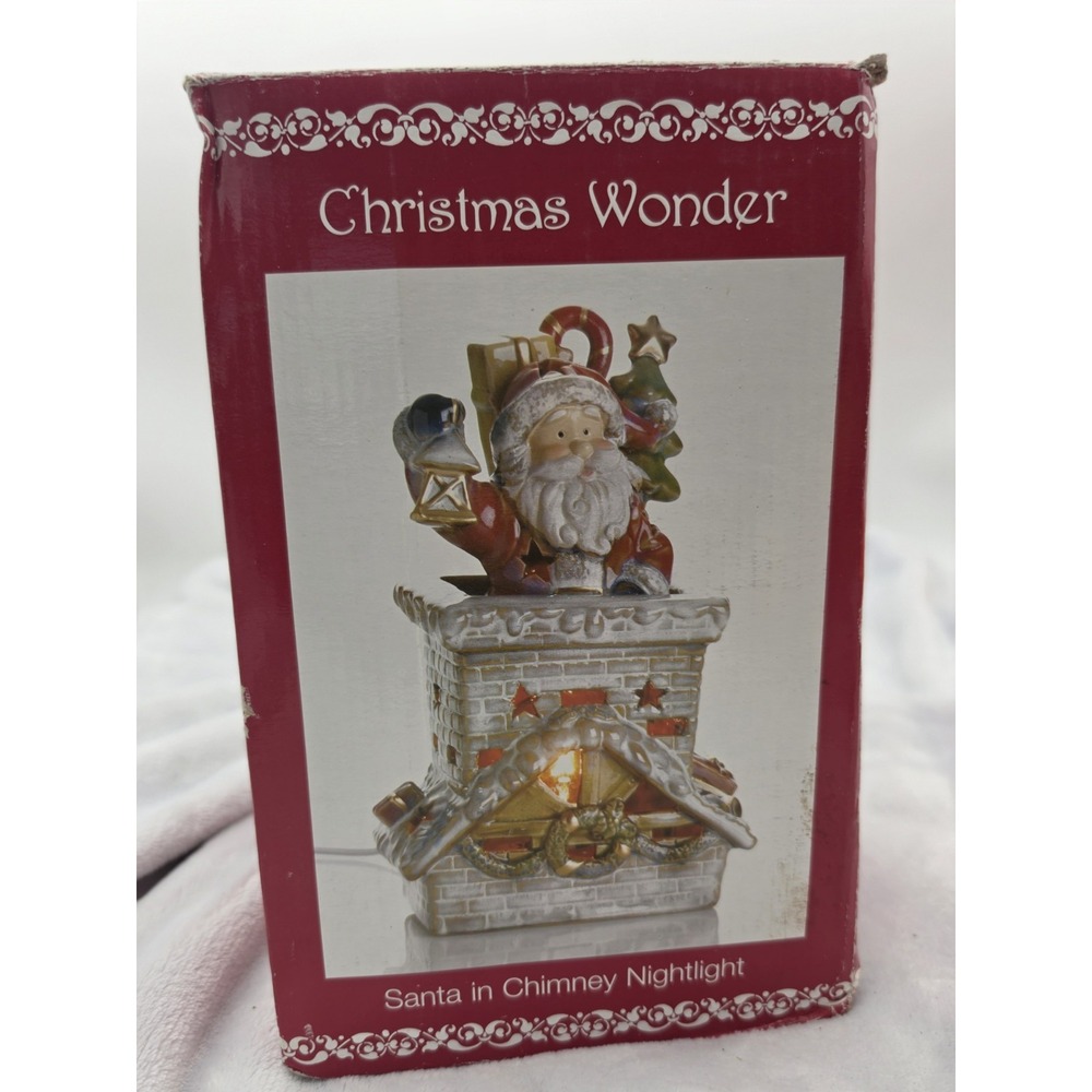 Santa Going Down Chimney Holding Lantern 10 in. Ceramic Electric Night Light